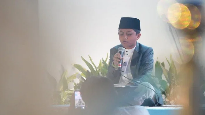 Empat kebiasaan sederhana orang tua agar anak mencintai Alquran sejak dini, berdasarkan pengalaman ayah Muhammad Zian Fahrezi, juara MTQ Internasional Irak. (Foto: Dok Kemenag)